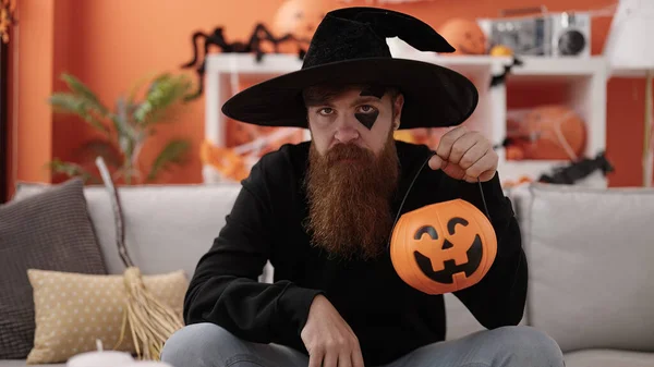 Young Redhead Man Wearing Wizard Costume Having Halloween Pumpkin Basket — Stockfoto