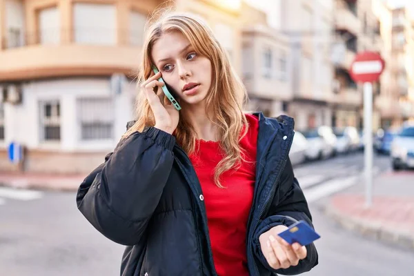 Young Blonde Woman Talking Smartphone Holding Credit Card Street —  Fotos de Stock