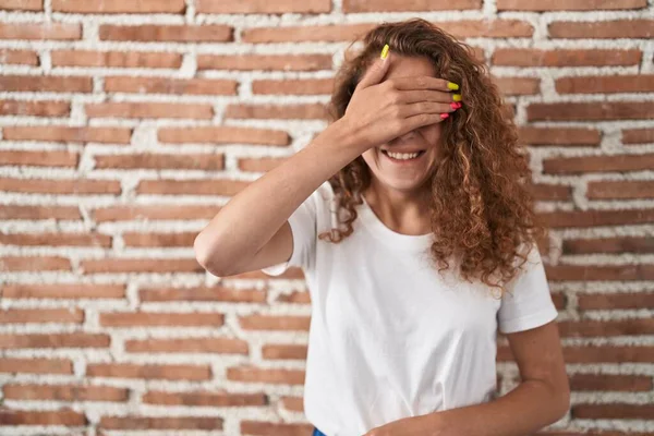 Young Caucasian Woman Standing Bricks Wall Background Smiling Laughing Hand — Stock Photo, Image