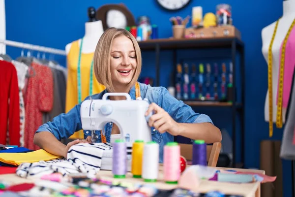Young Blonde Woman Tailor Smiling Confident Using Sewing Machine Sewing — Stock Photo, Image
