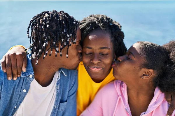 African American Friends Sitting Bench Together Kissing Seaside — Fotografia de Stock