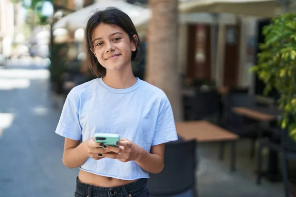 Adorable Hispanic Girl Smiling Confident Using Smartphone Street — 스톡 사진