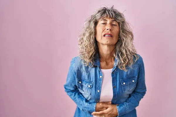 Middle Age Woman Standing Pink Background Hand Stomach Because Indigestion — Stock Photo, Image