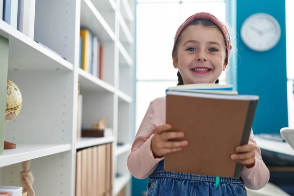 Adorable Hispanic Girl Student Smiling Confident Holding Books Classroom — ストック写真