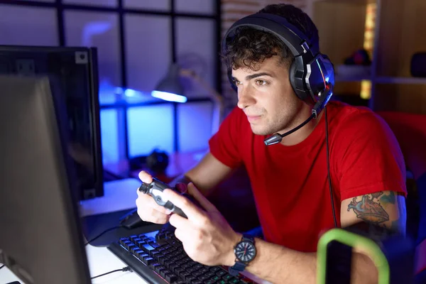 Young Hispanic Man Streamer Playing Video Game Using Joystick Gaming —  Fotos de Stock