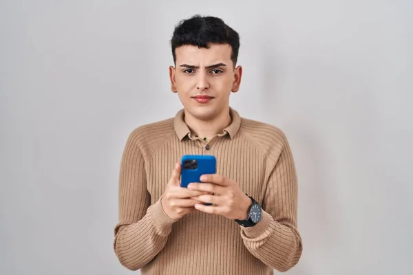 Non Binary Person Using Smartphone Typing Message Skeptic Nervous Frowning — Stock Photo, Image