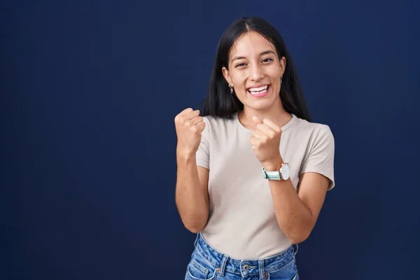 Young Hispanic Woman Standing Blue Background Very Happy Excited Doing — Stockfoto