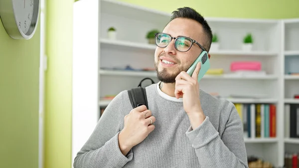 Hispanic Man Student Smiling Confident Speaking Phone Library University — Stock Photo, Image