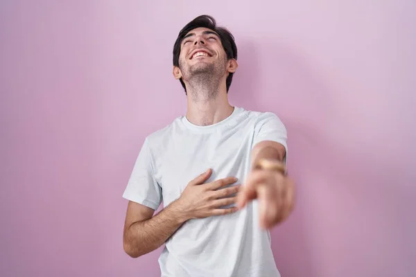 Young Hispanic Man Standing Pink Background Laughing You Pointing Finger — стоковое фото