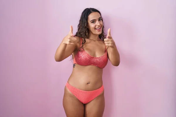 Young Hispanic Woman Wearing Lingerie Pink Background Pointing Fingers Camera — Stock Photo, Image
