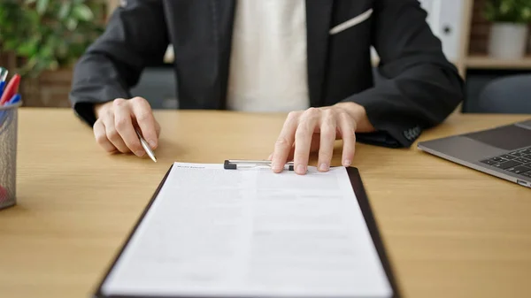 stock image Young arab man business worker signing contract at office