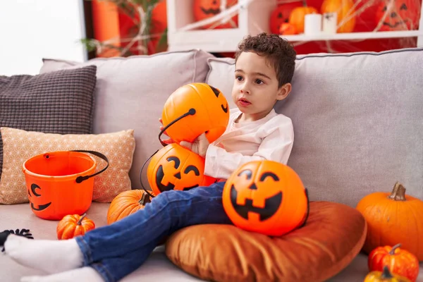 Adorable Hispanic Boy Having Halloween Party Holding Pumpkin Basket Home — Fotografia de Stock