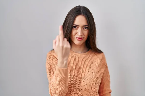 Young Brunette Woman Standing White Background Showing Middle Finger Impolite — стоковое фото
