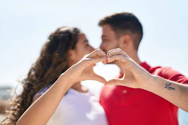 Young Hispanic Couple Smiling Confident Doing Heart Gesture Hands Seaside — Photo
