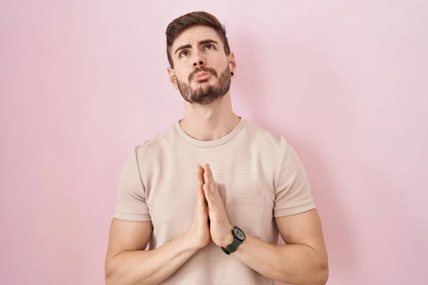 Hispanic Man Beard Standing Pink Background Begging Praying Hands Together — Stockfoto