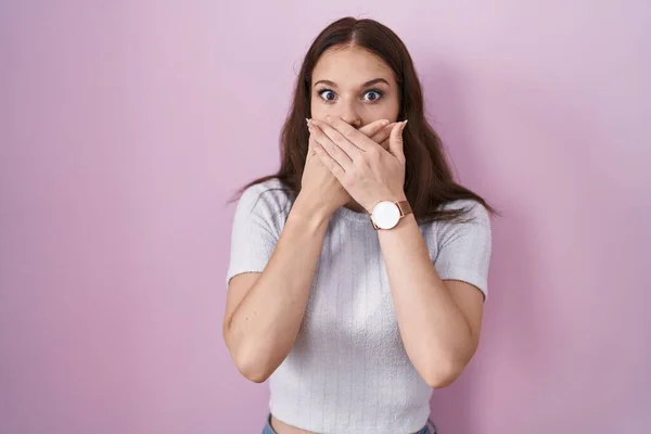 Young Hispanic Girl Standing Pink Background Shocked Covering Mouth Hands — Stock Photo, Image