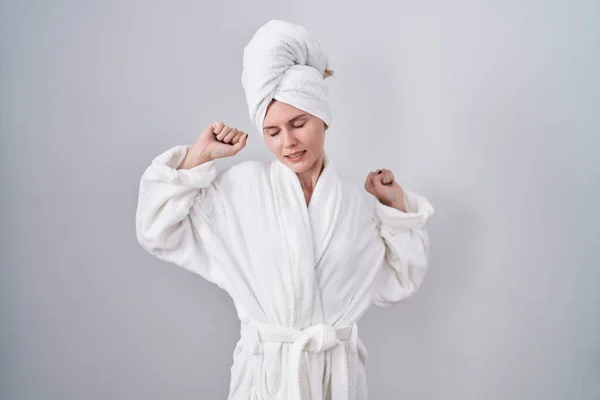Blonde Caucasian Woman Wearing Bathrobe Stretching Back Tired Relaxed Sleepy — Stock Photo, Image