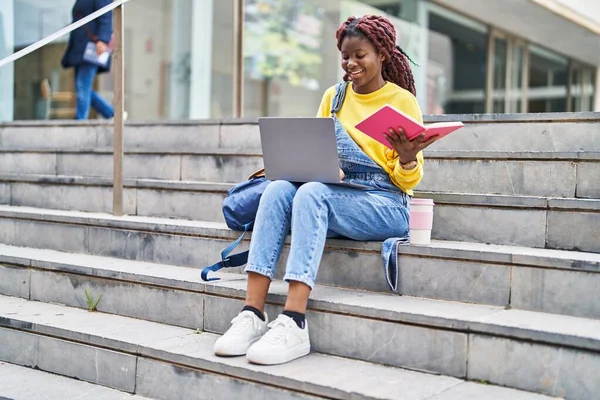 African American Woman Student Using Laptop Reading Book University — 图库照片