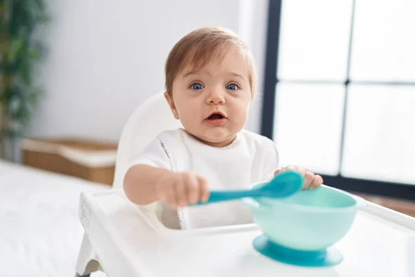 Adorable Caucasian Baby Sitting Highchair Holding Spoon Bedroom — Stock Photo, Image