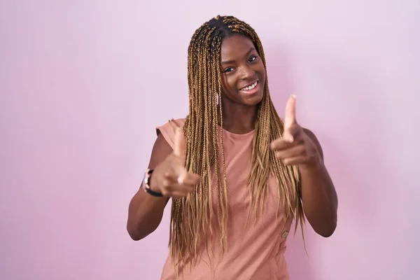 African American Woman Braided Hair Standing Pink Background Pointing Fingers — Photo