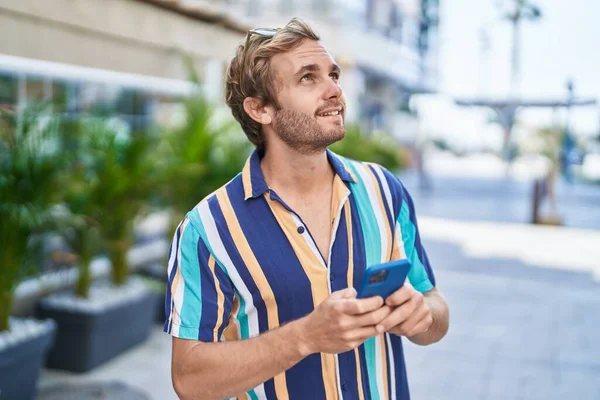Young Man Tourist Smiling Confident Using Smartphone Street — Fotografia de Stock