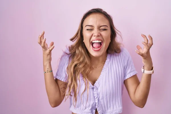 Young Hispanic Woman Standing Pink Background Celebrating Mad Crazy Success — Stock Fotó