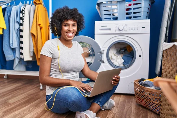 African American Woman Listening Music Waiting Washing Machine Laundry Room — Stok fotoğraf