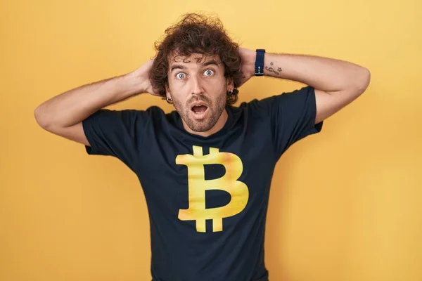 Hispanic Young Man Wearing Bitcoin Shirt Crazy Scared Hands Head — Stock Photo, Image