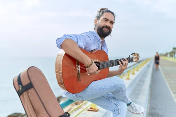 Young Hispanic Man Musician Playing Classical Guitar Sitting Balustrade Seaside — Stockfoto