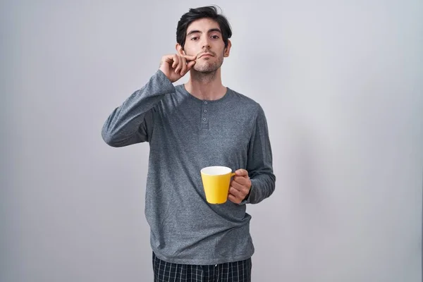 Young Hispanic Man Wearing Pajama Drinking Cup Coffee Mouth Lips — Stock Photo, Image