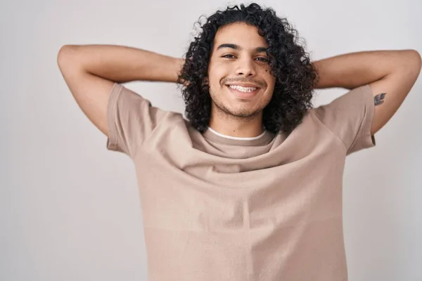 Hispanic Man Curly Hair Standing White Background Relaxing Stretching Arms — Stock Photo, Image