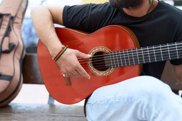 Young Hispanic Man Musician Playing Classical Guitar Sitting Bench Street — Fotografia de Stock