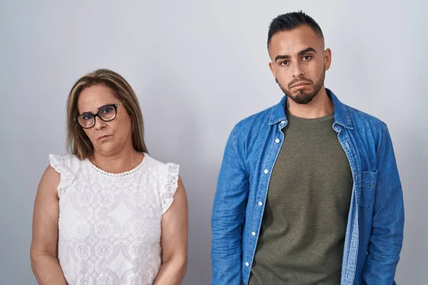 Hispanic Mother Son Standing Together Depressed Worry Distress Crying Angry — Stockfoto