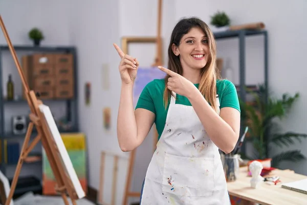 Young Brunette Woman Art Studio Smiling Looking Camera Pointing Two — Stock Photo, Image