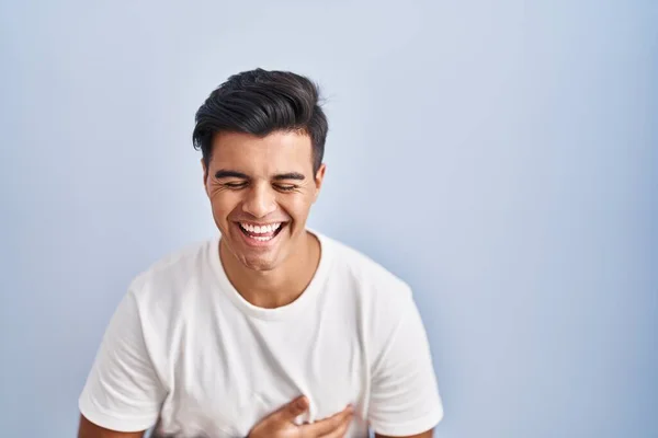 Hispanic Man Standing Blue Background Smiling Laughing Hard Out Loud — Stock Photo, Image