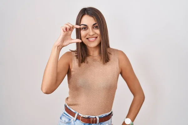 Young Hispanic Woman Standing White Background Smiling Confident Gesturing Hand — 图库照片