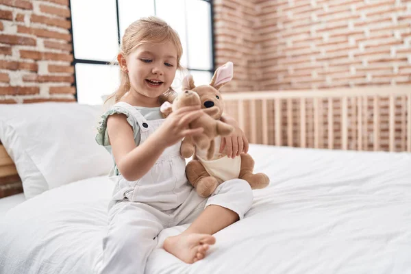 Adorable Blonde Girl Playing Doll Sitting Bed Bedroom — Stock Photo, Image