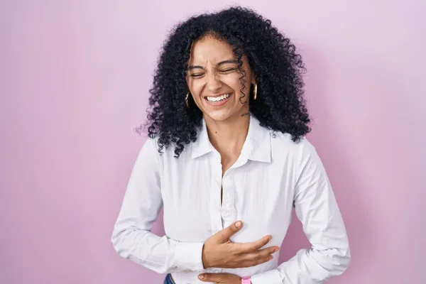 Hispanic Woman Curly Hair Standing Pink Background Smiling Laughing Hard — Foto de Stock