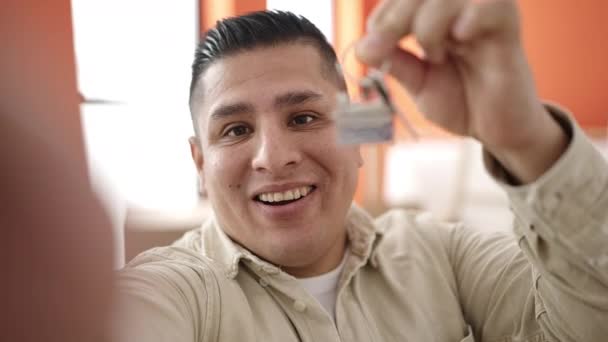 Young Hispanic Man Having Video Call Holding Keys New Home — Stock Video