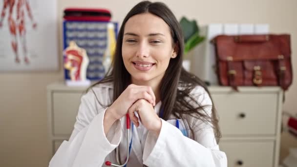 Young Beautiful Hispanic Woman Doctor Smiling Confident Sitting Table Clinic — Video