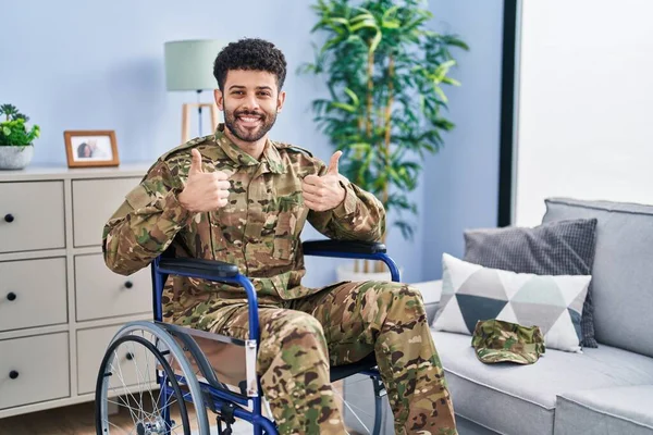 Arab Man Wearing Camouflage Army Uniform Sitting Wheelchair Success Sign — Stock Photo, Image