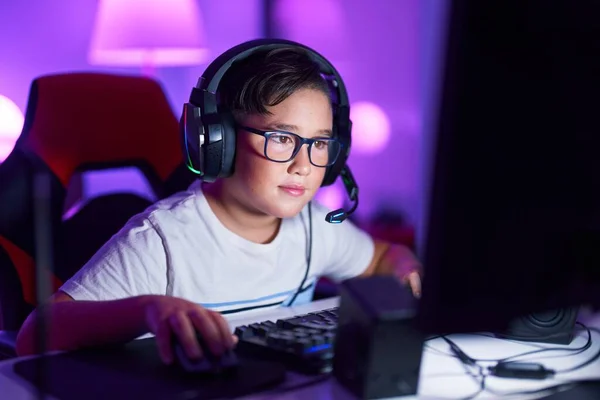 Adorable Hispanic Boy Streamer Playing Video Game Using Computer Gaming — Foto de Stock