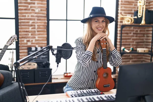 Young Blonde Woman Musician Smiling Confident Leaning Ukelele Music Studio — Stock Photo, Image
