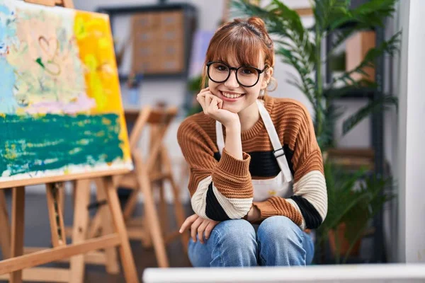 Young Woman Artist Smiling Confident Sitting Chair Art Studio — стоковое фото