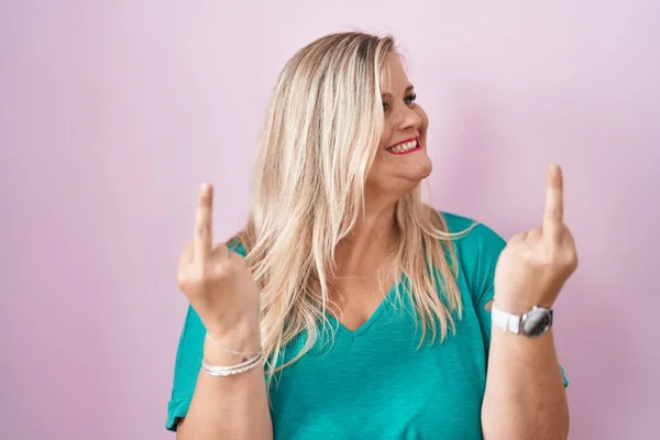 Caucasian Size Woman Standing Pink Background Showing Middle Finger Doing — стоковое фото