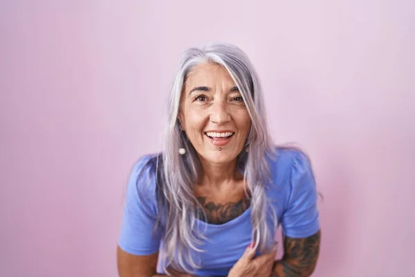 Middle Age Woman Tattoos Standing Pink Background Smiling Laughing Hard — Stock Photo, Image