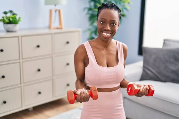 African American Woman Smiling Confident Using Dumbbells Training Home — Stock Fotó