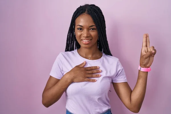 African American Woman Braids Standing Pink Background Smiling Swearing Hand — Stock Photo, Image