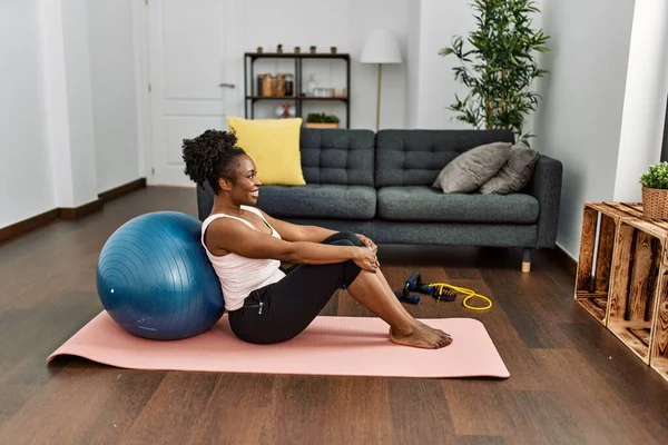 African American Woman Smiling Confident Sitting Yoga Mat Home — Stockfoto