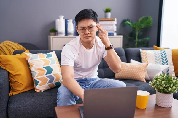 Young Asian Man Using Laptop Home Sitting Sofa Shooting Killing — Stock Photo, Image